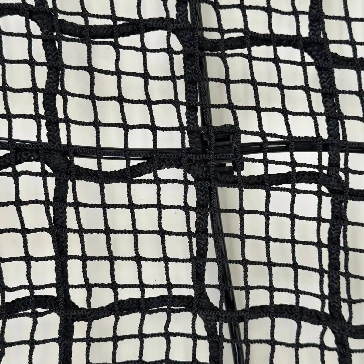 Close-up of aramid fiber anti-drone netting weave pattern showing mesh aperture